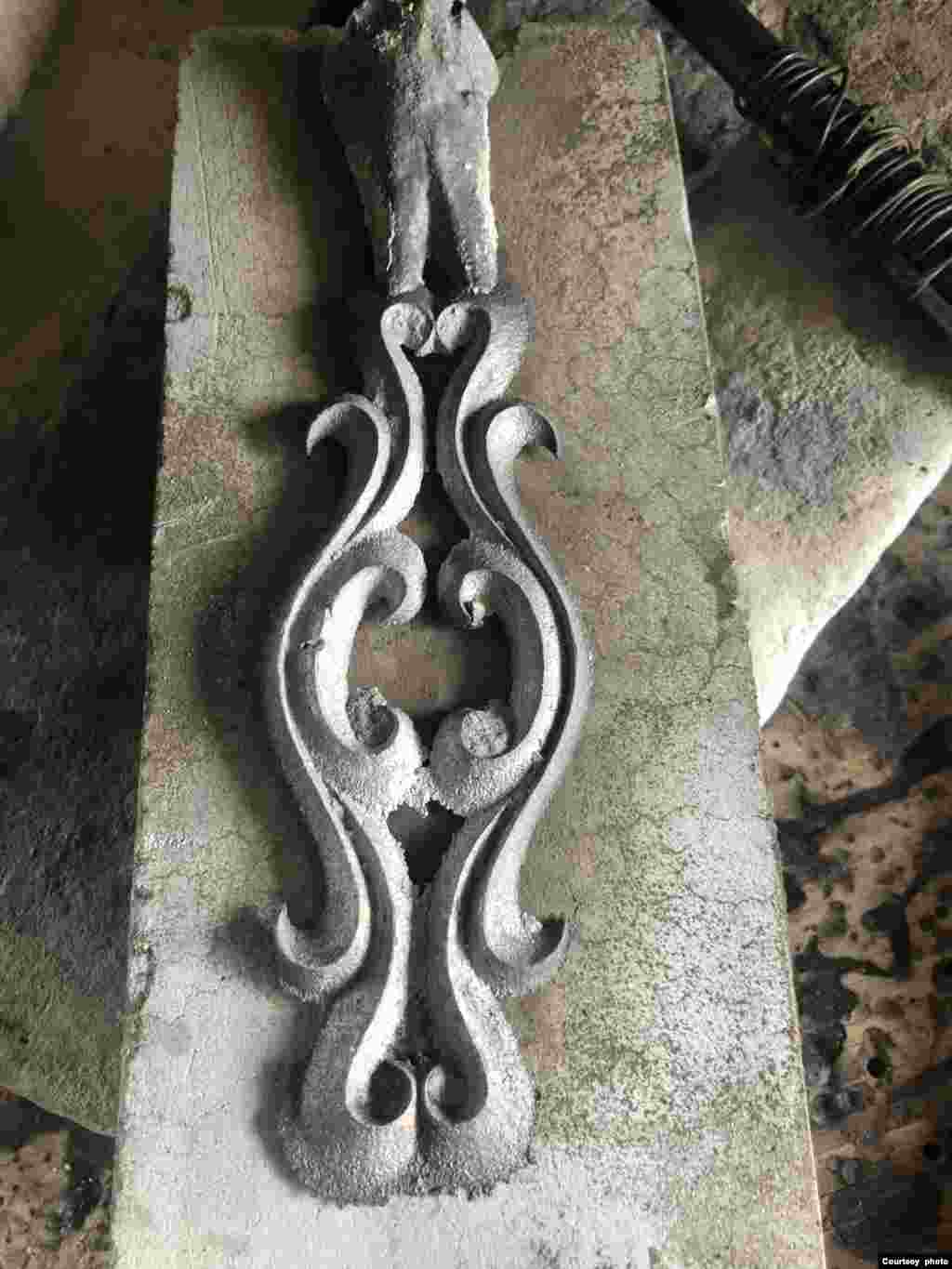 The artist pulls the casting from the stone. It is ready to be cleaned, polished and set with stones, if desired. 