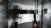 The closed office of the Mintz Group is seen in an office building in Beijing on March 24, 2023.