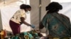 FILE - Umkhuhlane wohudo umemetheka kakhulu endaweni okungelamanzi ahlunzekileyo 
