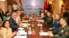 Indian Defense Minister Rajnath Singh, 3rd left, attends a meeting with his Chinese counterpart Li Shangfu, 3rd right, during the Shanghai Cooperation Organization Defense Minister's Meeting in New Delhi, April 27, 2023.