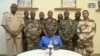 Les militaires putschistes nigérien lors de leur première allocution télévisée après leur prise de pouvoir.