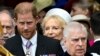 Britain's Prince Harry, Duke of Sussex, and Prince Andrew leave Westminster Abbey following the coronation of Britain's King Charles and Queen Camilla, in London, May 6, 2023.