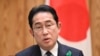 Japans Prime Minister Fumio Kishida answers questions during a group meeting with the foreign media at the prime ministers official residence on April 20, 2023. (Photo by Kazuhiro NOGI / AFP)