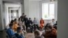 FILE - Children attend a group therapy class at the recovery camp for children and their mothers affected by the war near Lviv, Ukraine, Wednsday, May 3, 2023. 