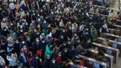 中國稱春運高峰前夕全國疫情趨緩