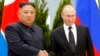 FILE - Russian President Vladimir Putin, right, and North Korea's leader Kim Jong Un shake hands during their meeting in Vladivostok, Russia, April 25, 2019.