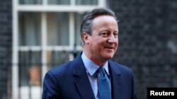 英國前首相、新任外相卡梅倫在倫敦唐寧街 10 號外
