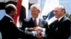 FILE - In this March 26, 1979, file photo, Egyptian President Anwar Sadat, left, U.S. President Jimmy Carter, center, and Israeli Prime Minister Menachem Begin clasp hands on the North lawn of the White House as they completed signing of the peace treaty 