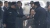 中国一些民众认为遭到政府官员不公对待而上访，一名上访妇女被北京警察拘押