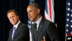El presidente Barack Obama junto al primer ministro británico, David Cameron, en Bruselas.