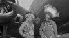 Gus Palmer (Kiowa, at left), side gunner, and Horace Poolaw (Kiowa), aerial photographer, in front of a B-17 Flying Fortress. MacDill Field, Tampa, Florida, ca. 1944. 45UFL14. © 2014 Estate of Horace Poolaw. Reprinted with permission.