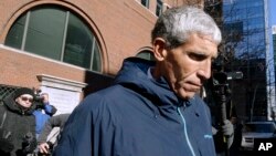 William "Rick" Singer founder of the Edge College & Career Network, departs federal court in Boston on March 12, 2019, after he pleaded guilty to charges in a nationwide college admissions bribery scandal.