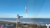 SpaceX catches Starship booster again, but upper stage explodes