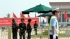 2014年8月3日，中国武装警察把守在北京天安门广场。 