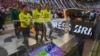 L'arbitre brésilien Wilton Pereira Sampaio et ses assistants passent devant un écran du Video Assistant Referee (VAR), Buenos Aires, le 25 octobre 2017.