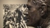 A statue of President John F. Kennedy is pictured at the Sixth Floor Museum, which honors the slain president, in Dallas, Texas. (VOA)