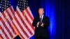 President Donald Trump applauds after delivering a speech, laying out a national security strategy, in Washington, Dec. 18, 2017.