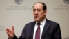 FILE - Iraqi Prime Minister Nuri al-Maliki speaks at a United States Institute of Peace forum on Iraq's transition in Washington October 31, 2013.