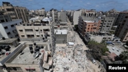 Una vista muestra el sitio de los ataques aéreos israelíes, en medio de los combates entre israelíes y palestinos, en Gaza, el 20 de mayo de 2021. REUTERS / Mohammed Salem