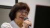 Atomic bomb survivor Teruko Yahata speaks to foreign visitors in Hiroshima