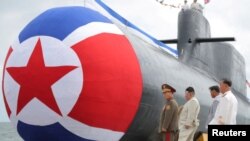 北韓官媒2023年9月8日發布照片顯示，北韓領導人金正恩出席戰略核攻擊潛艇下水儀式。