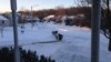 The snow covers the ground outside the Farabaugh home near Chicago, Illinois, Jan. 6, 2014. (VOA/Kane Farabaugh)