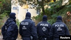 Suspected members and supporters of a far-right group were detained during raids, in Berlin