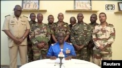 Niger Army spokesman Colonel Major Amadou Adramane speaks during an appearance on national television