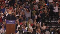 Violentas protestas anti-Trump y criticas contra Clinton