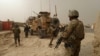 美军士兵守卫在一个在阿富汗的军事基地入口处(资料照片)