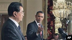美國總統奧巴馬和中國國家主席胡錦濤周三在聯合記者會上