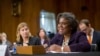 FILE - Assistant Secretary of State for African Affairs Linda Thomas-Greenfield, right, testifies during a Senate Foreign Relations Committee hearing on Capitol Hill in Washington, January 9, 2014.